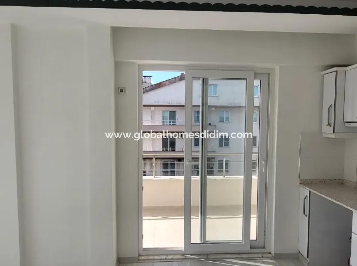 Didim Çarşı Merkezde 1+1 Daire Satilik